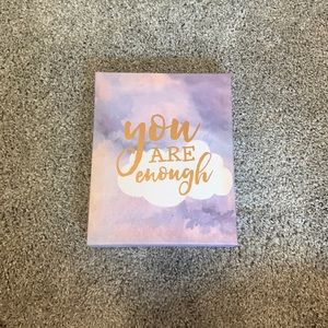 Looks new, no dents,cuts,1 small dot mark